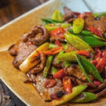 Cần tây xào gan heo tăng cường chuyện phòng the